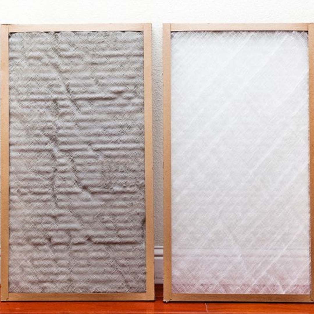 Dirty and clean HVAC air filter comparison