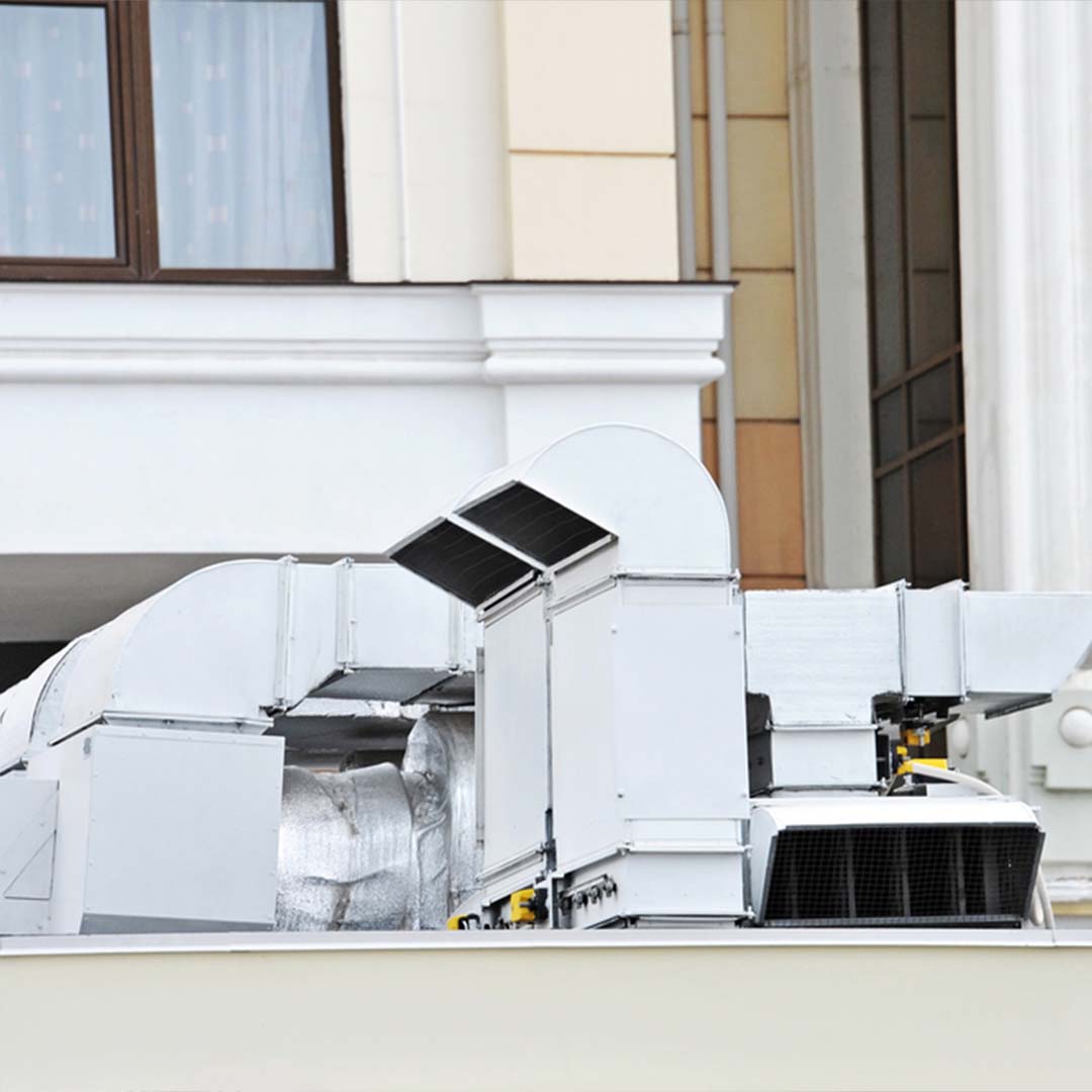 Modern FTX ventilation unit with air ducts and heat recovery